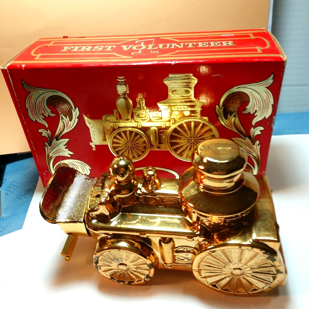 1970's Avon First Volunteer Decanter Tai Winds in Original Box Empty Bottle